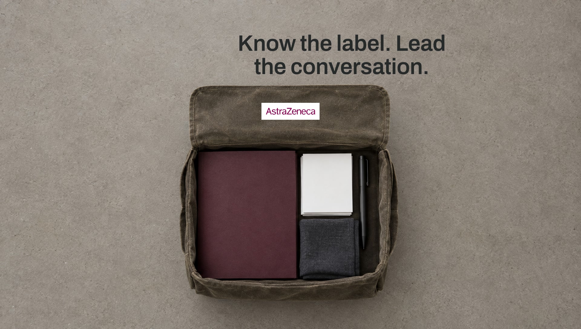 Key art: a field bag packed square with a mulberry folder and blank cards, with the line Know the label. Lead the conversation.